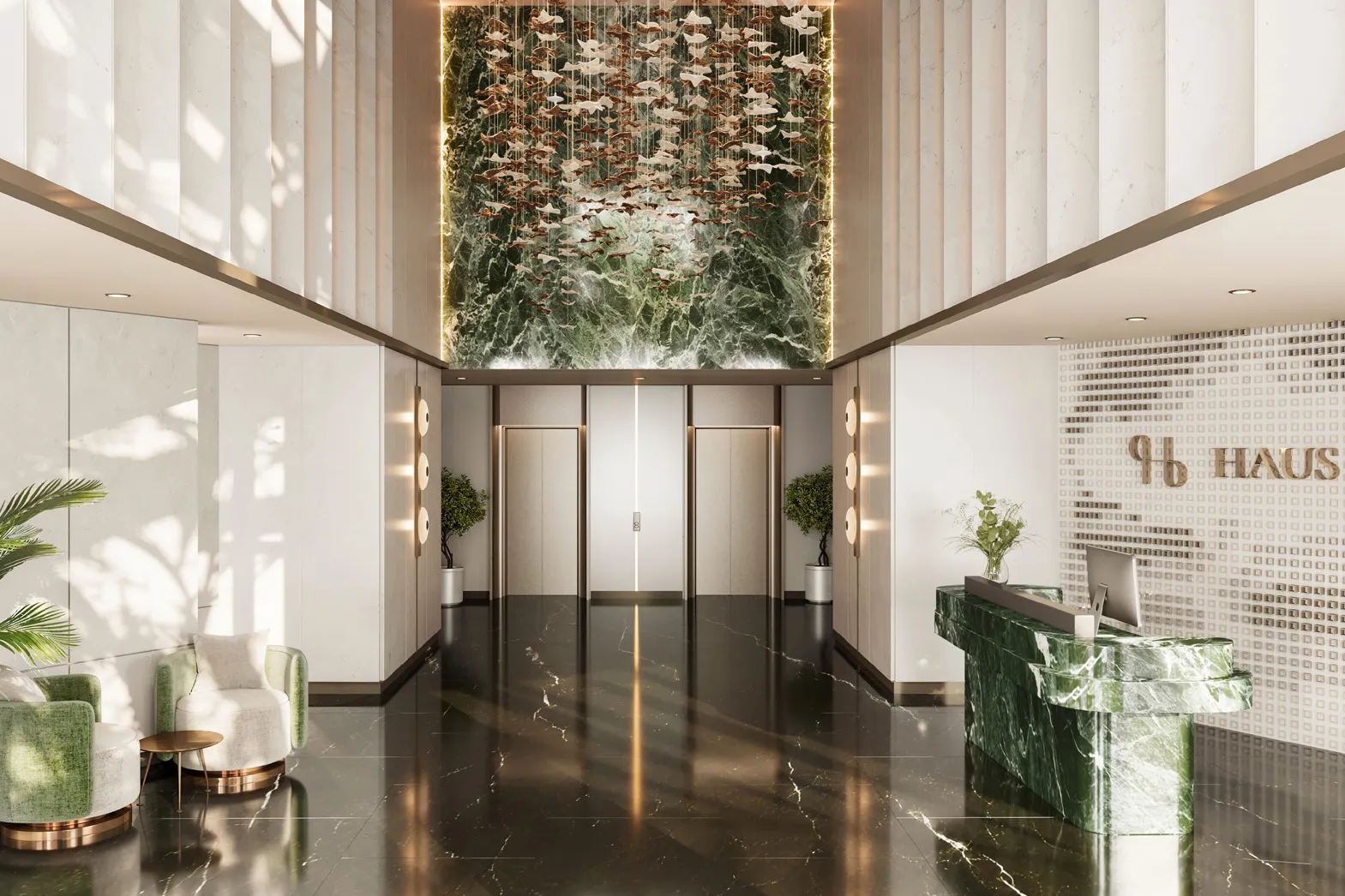 Lobby with green marble reception desk and a hanging sculpture